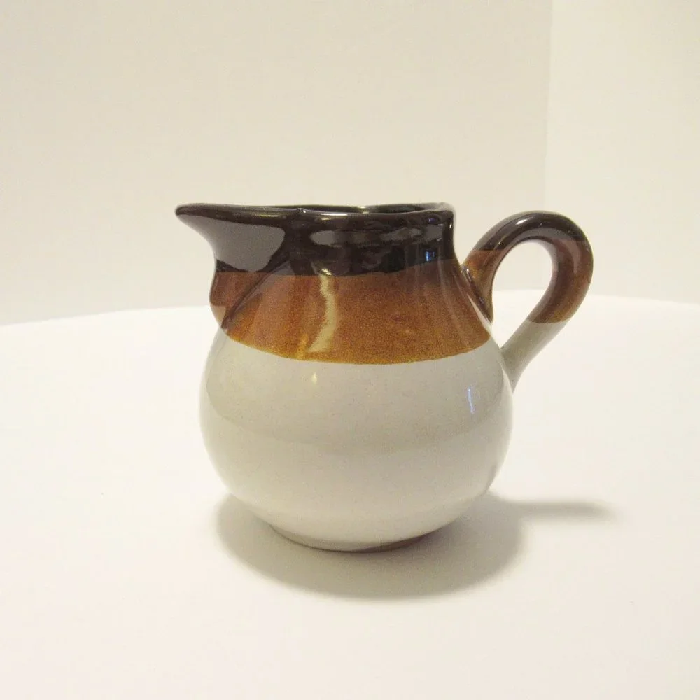 Brown and White Ceramic Serveware Pitcher